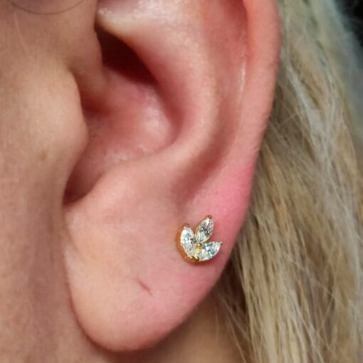 Piercing de oro con zirconias