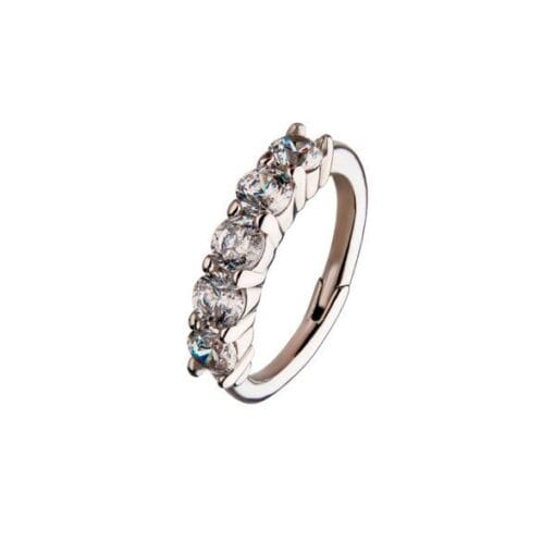 Aro de oro blanco macizo de 14 Kt. con 5 Zirconias