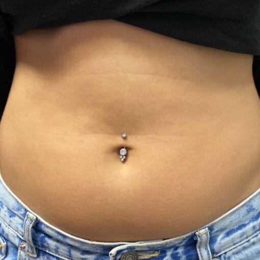 Piercing de ombligo de titanio con zirconias