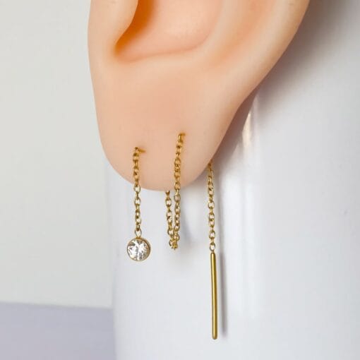 Cadena oro 24 Kt. con pasador y zirconia para conectar piercings
