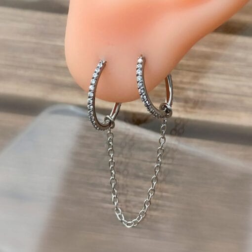 Cadena conectora de piercings