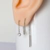 Cadena con pasador y zirconia para conectar piercings