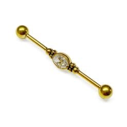 Piercing industrial de oro con una zirconia