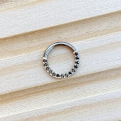 Clicker de titanio con zirconias frontales color negro