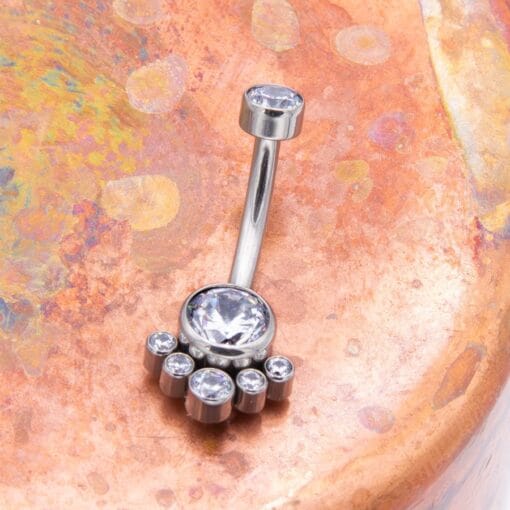 Piercing de ombligo con 7 zirconias