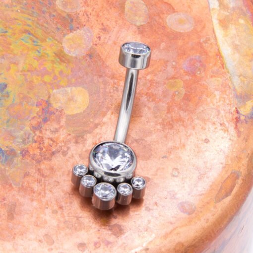 Piercing de ombligo con 7 zirconias