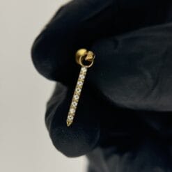 Top de titanio, baño de oro y zirconias en línea