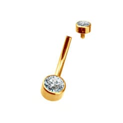 Alternative view of Piercing de ombligo. De titanio con baño de oro y 2 zirconias